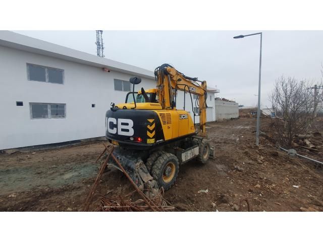Excavator pe pneuri JCB JS145WTT4F — imagine 5